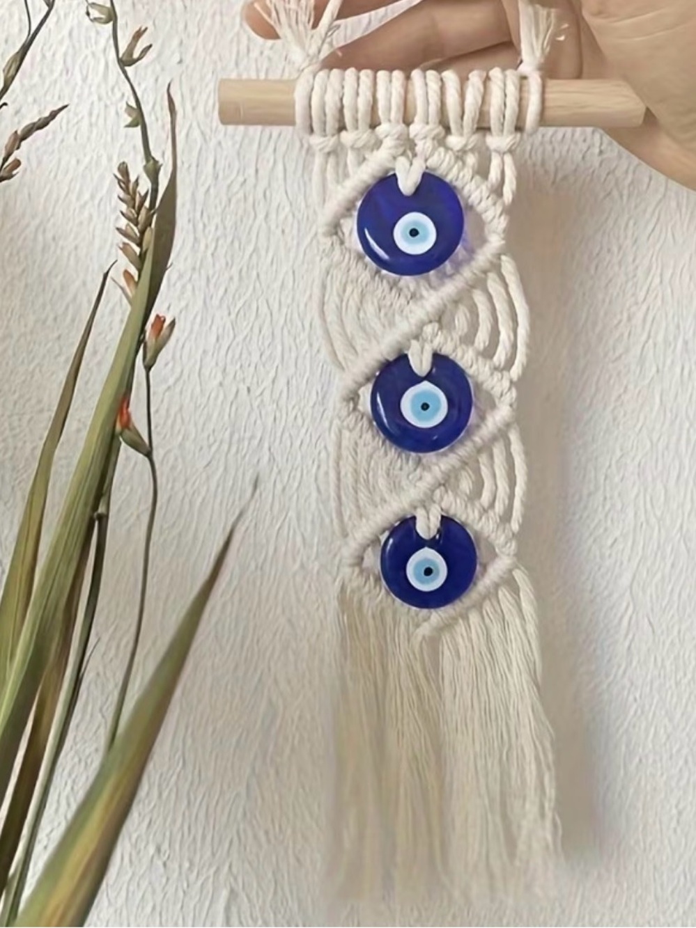 Handcrafted Macrame Wall Hanging with Blue Evil Eye Accents